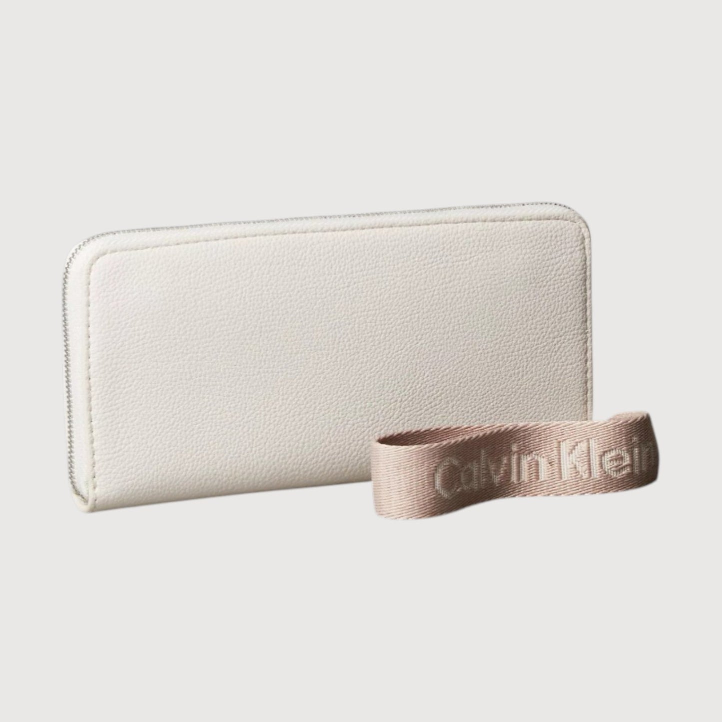 Cartera de muñeca con cremallera Calvin Klein color Tiza