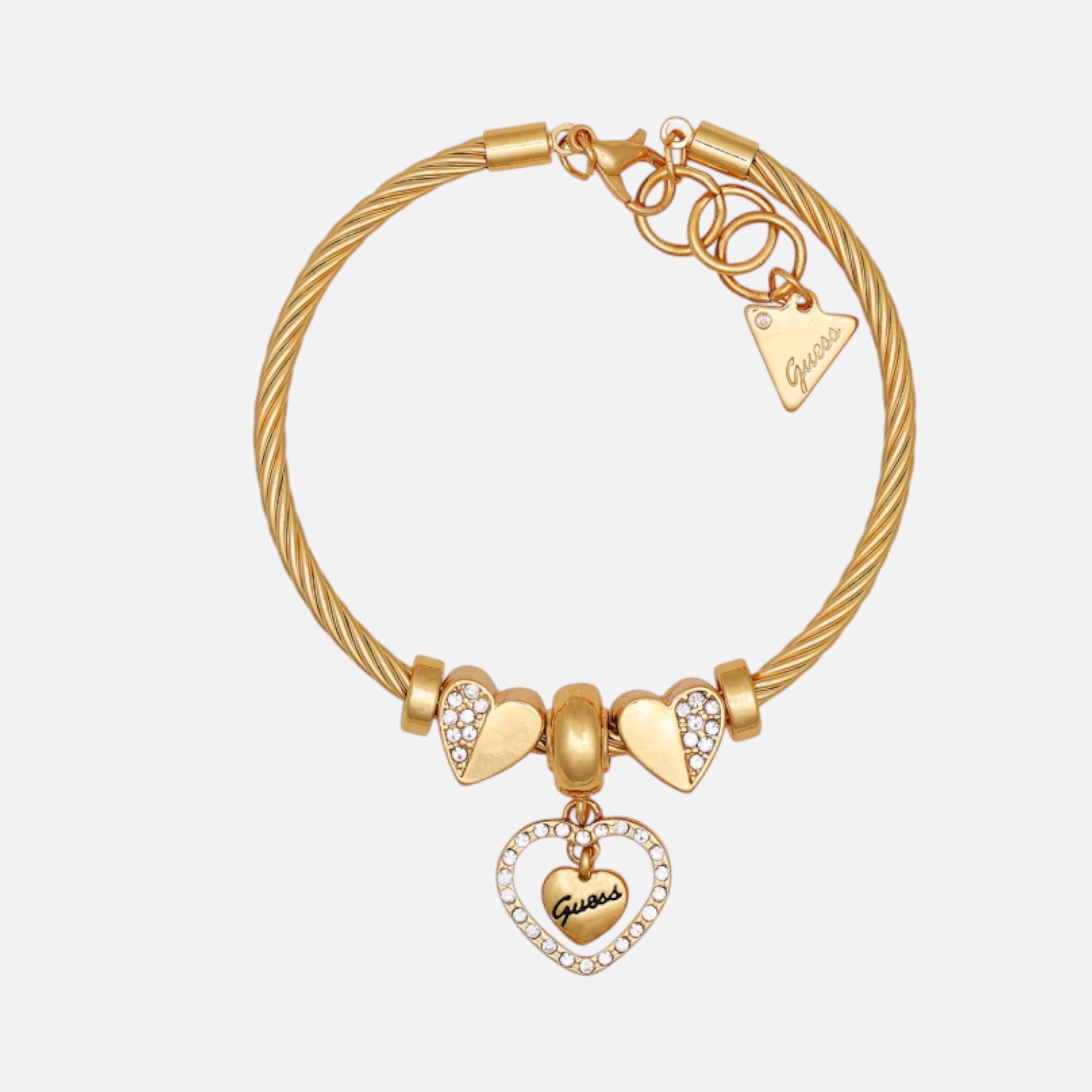 Pulsera con dije de corazón en tono dorado Guess