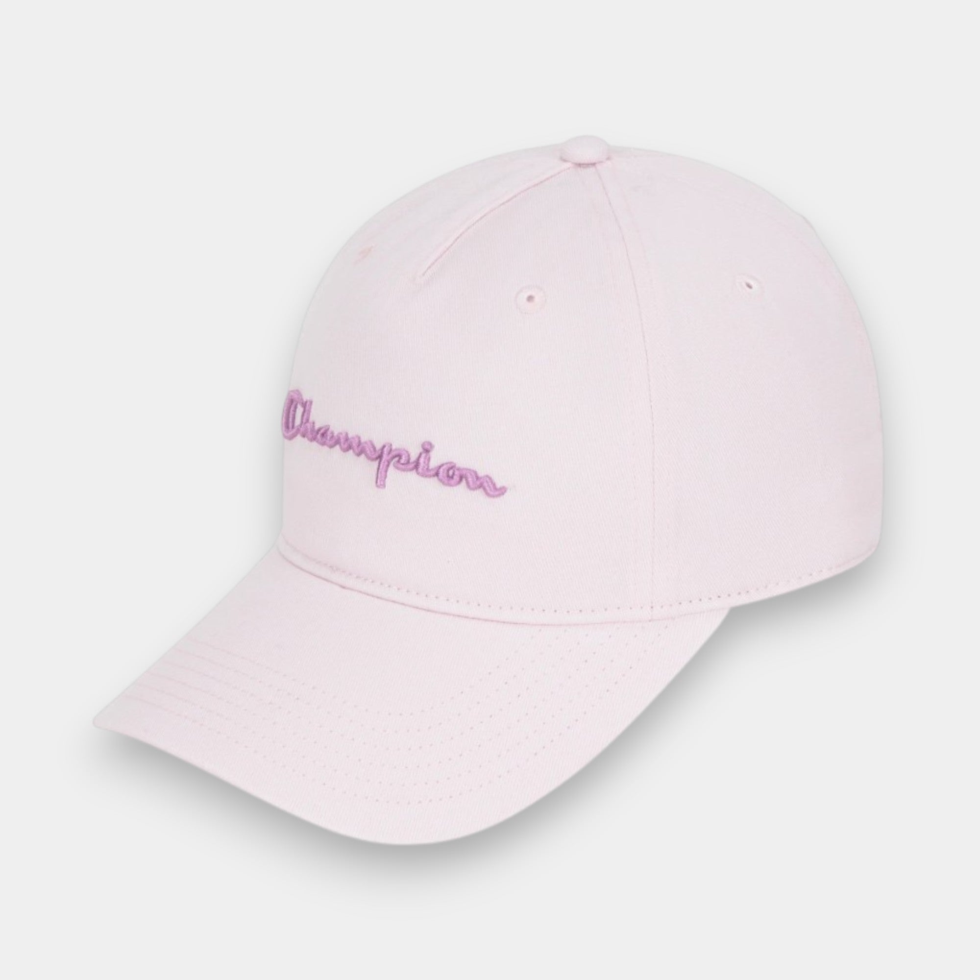 Gorra  Champion ajustable con bordado de escritura rosa